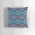 Moquette-inspired blue and maroon patterned throw pillow, perfect for home decor