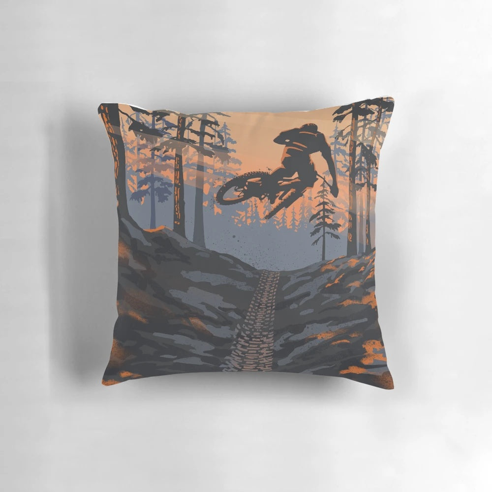 Retro-inspired mountain biking pillow featuring a scenic sunset landscape with a dirt jumper cyclist.