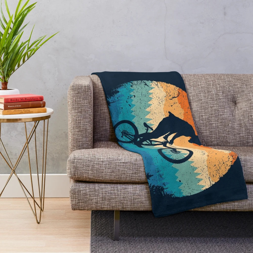 Retro mountain biking plush blanket with cyclist and bicycle