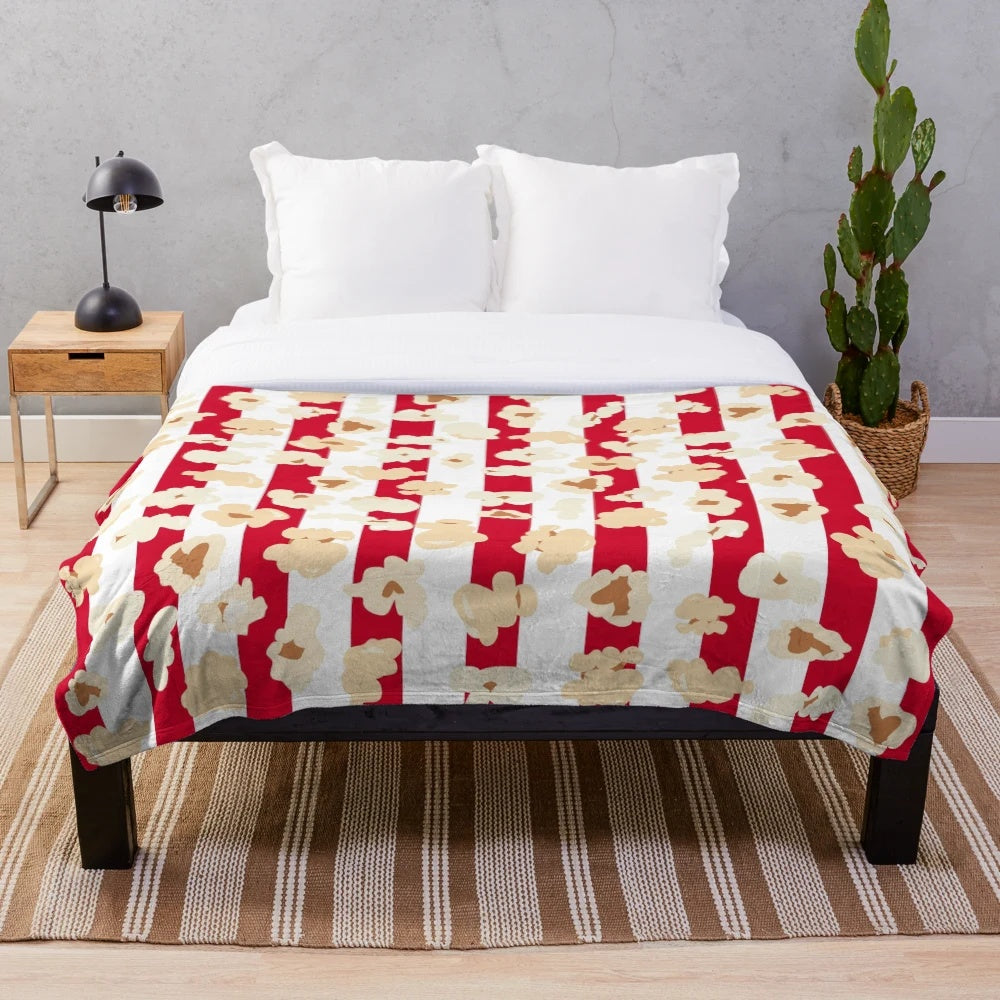 Retro movie cinema inspired plush blanket with popcorn design