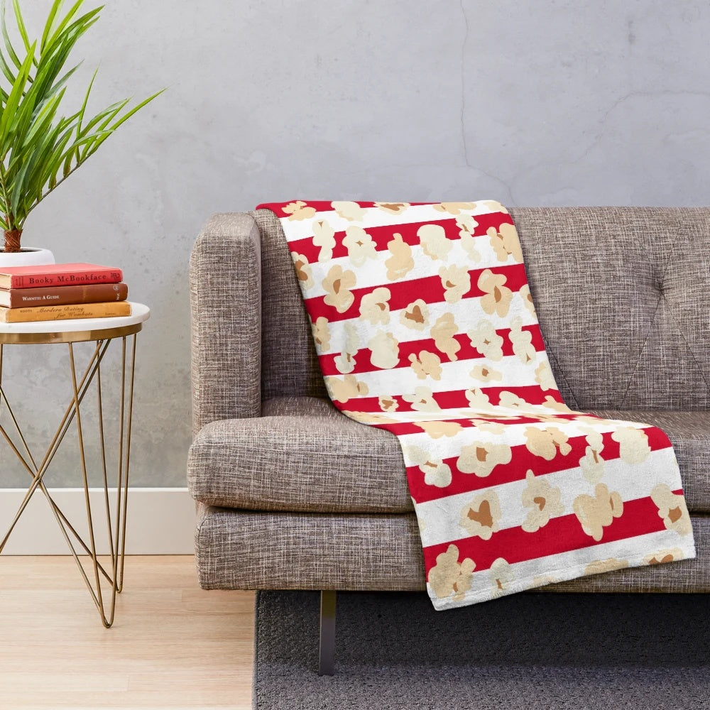 Retro movie cinema inspired plush blanket with popcorn design