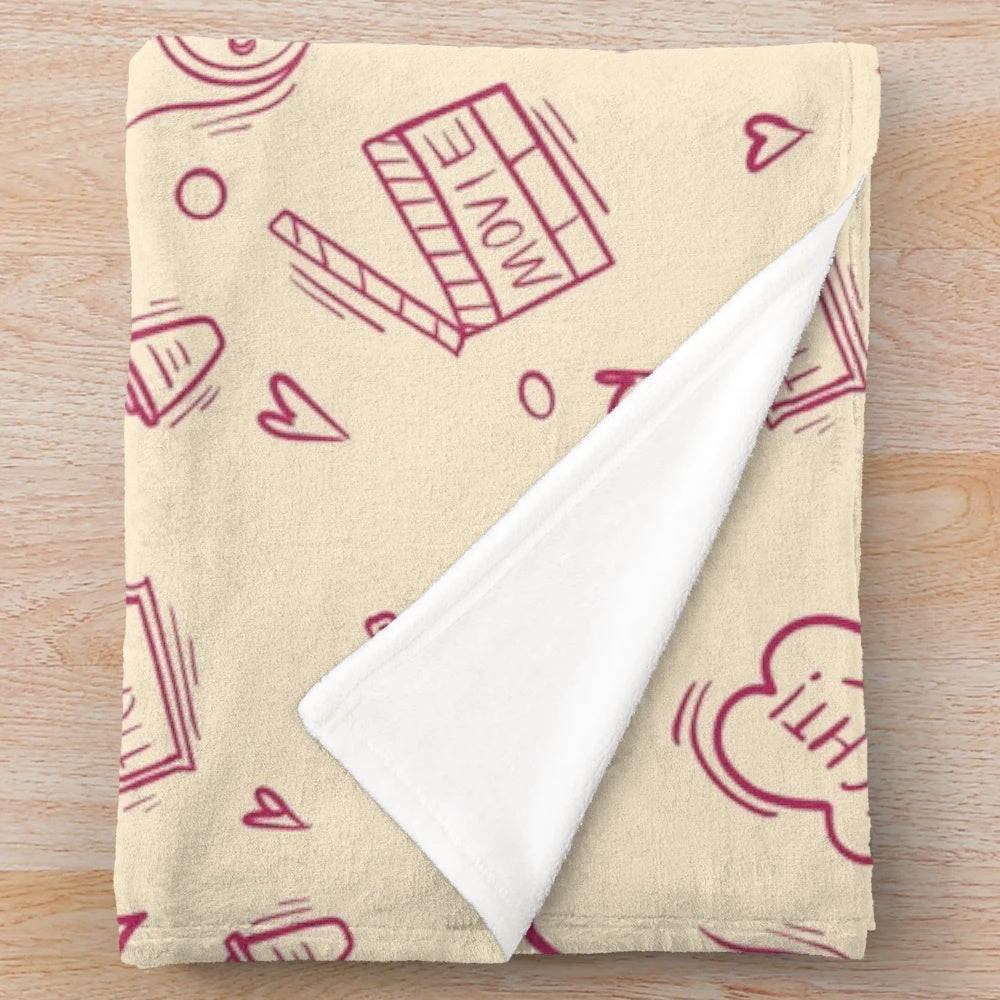 Plush blanket with a retro movie pattern design
