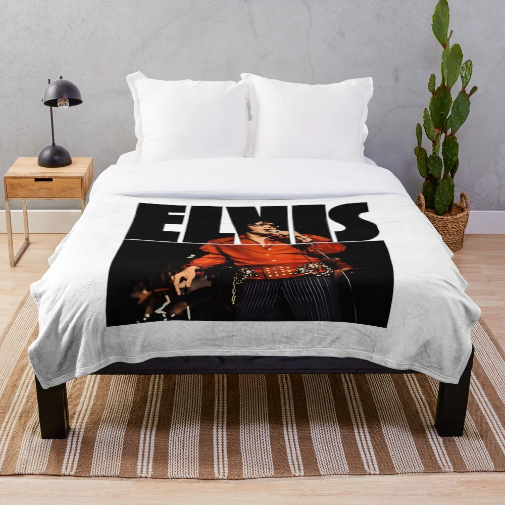 Vintage-style plush blanket featuring classic Elvis Presley logo and music theme