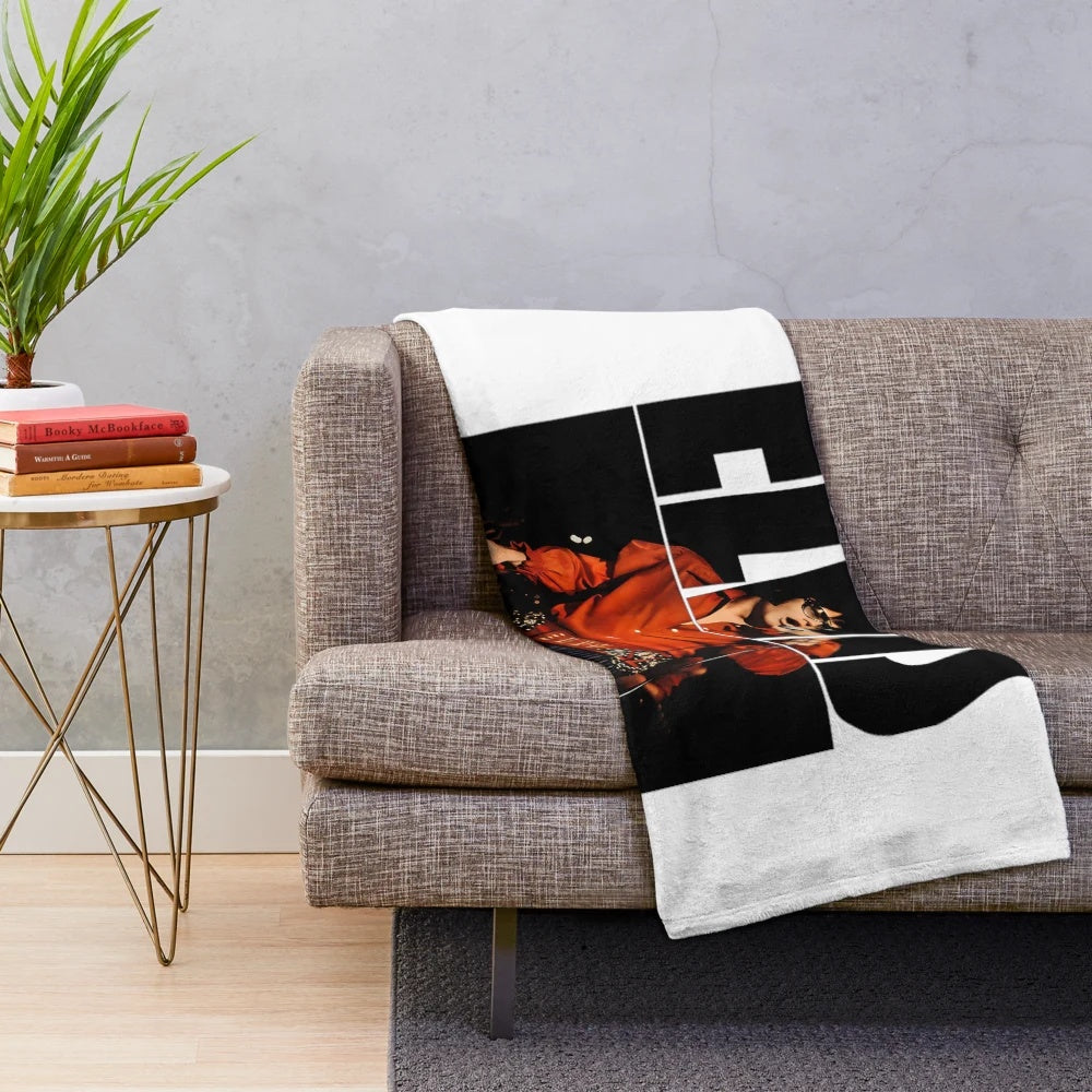 Vintage-style plush blanket featuring classic Elvis Presley logo and music theme