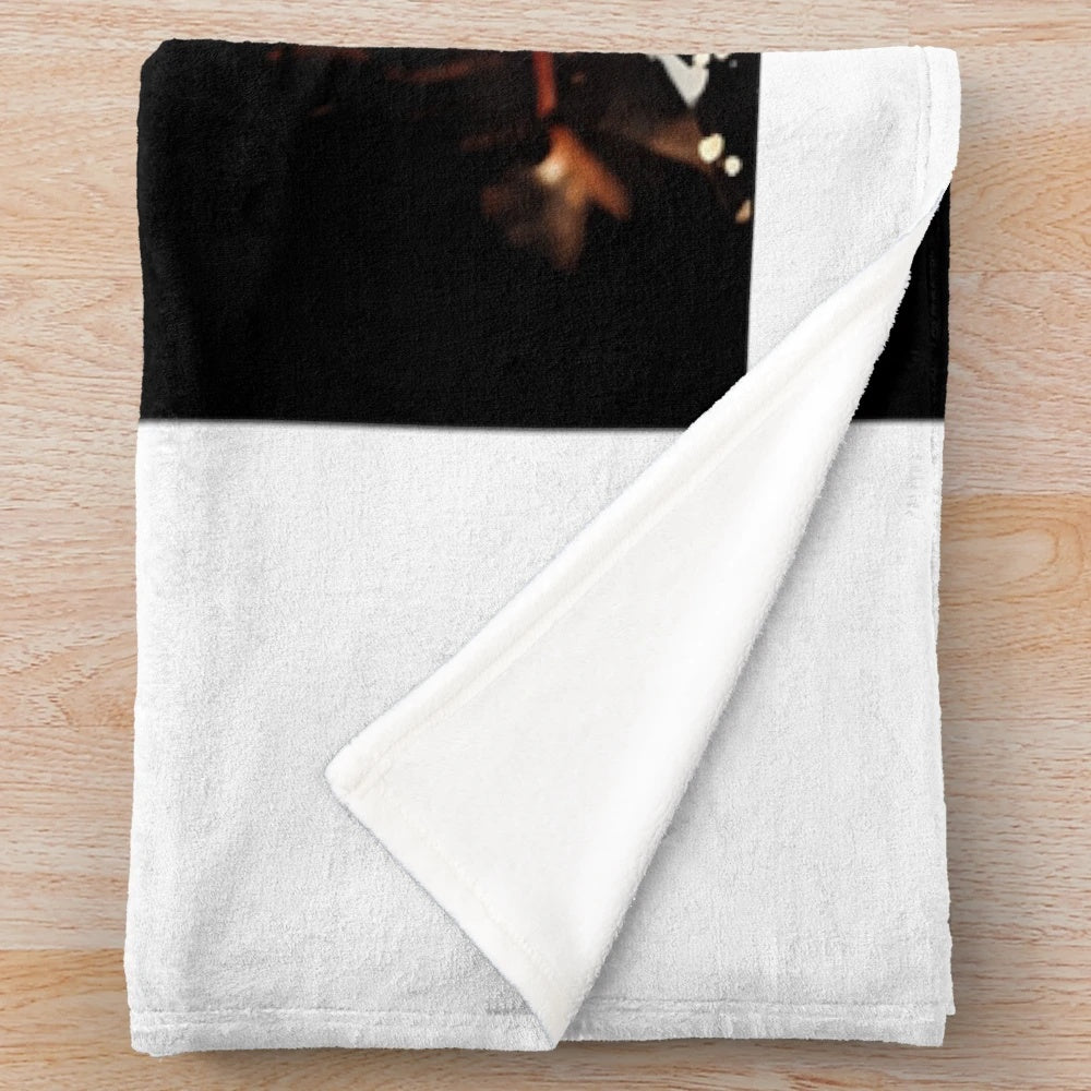 Vintage-style plush blanket featuring classic Elvis Presley logo and music theme
