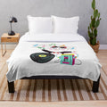 Retro music plush blanket with cassette tapes, headphones, and musical notes