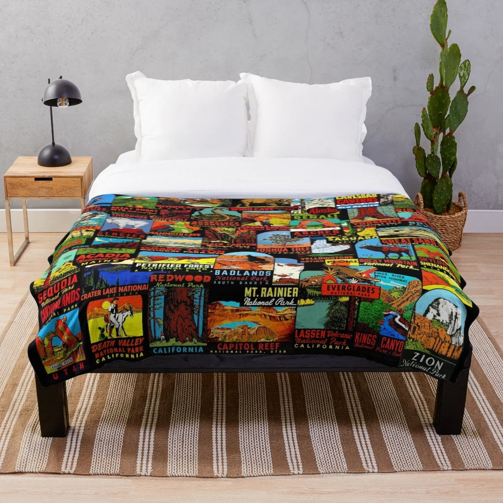 Vintage-style plush blanket featuring a collage of national park travel decals