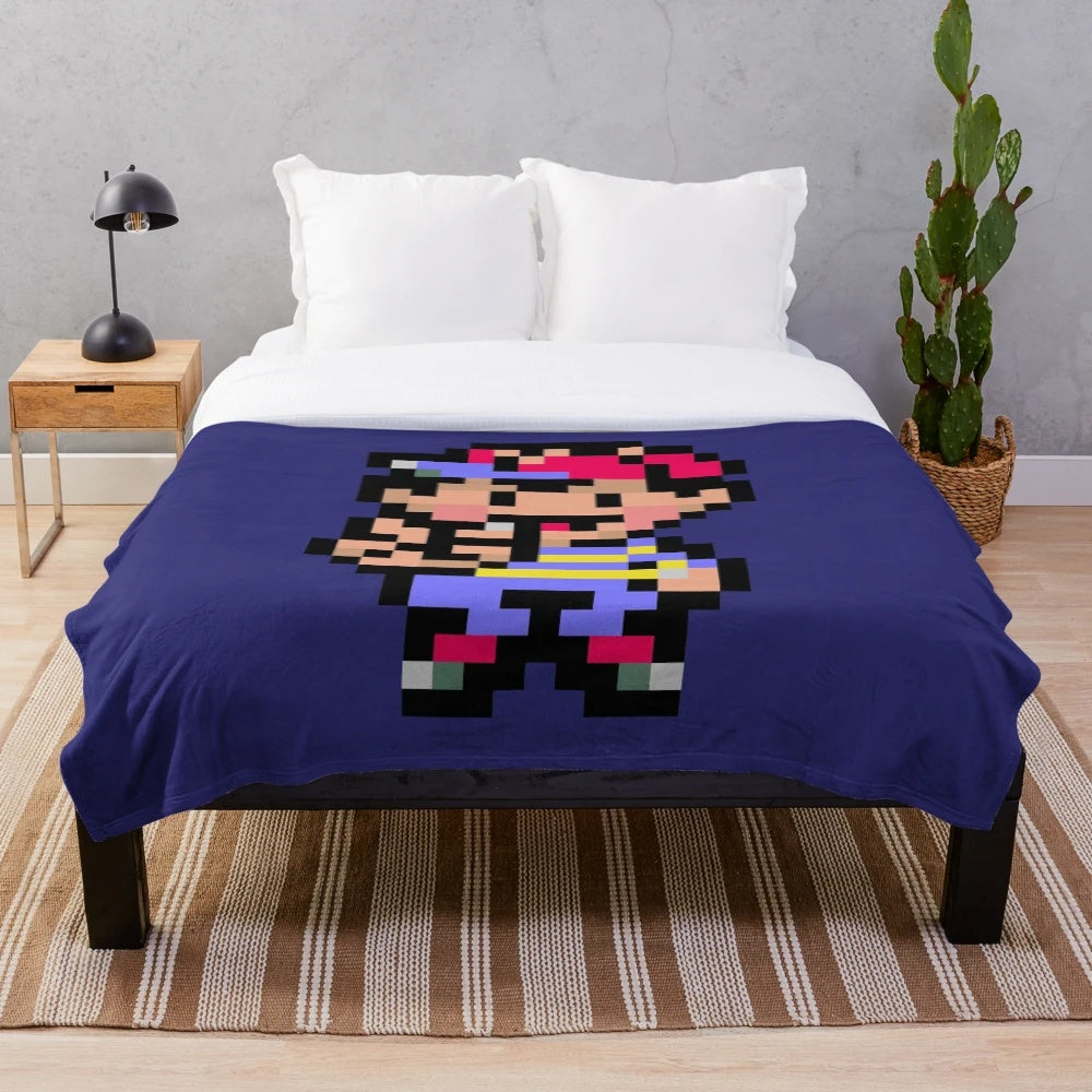 Retro Ness sprite plush blanket featuring pixel art inspired by the classic RPG Earthbound