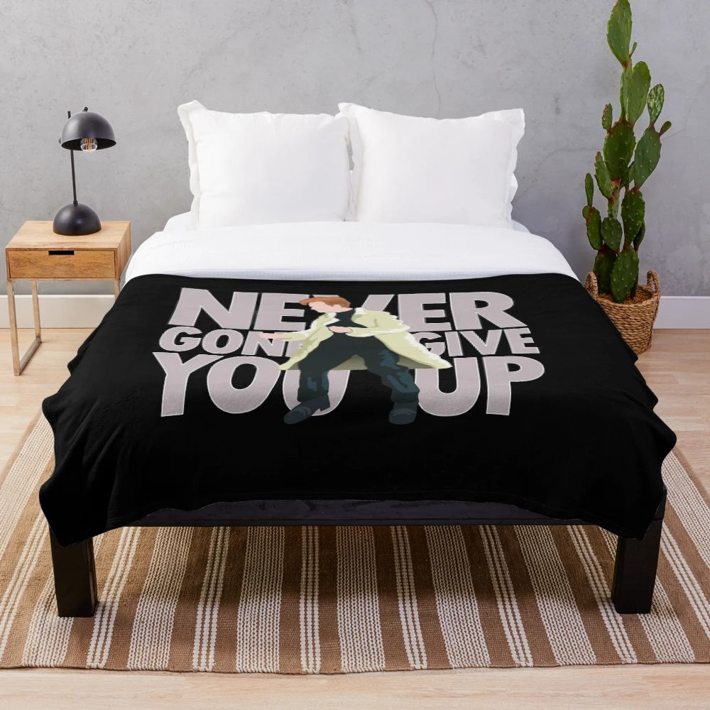 Plush blanket featuring Rick Astley's iconic "Never Gonna Give You Up" design