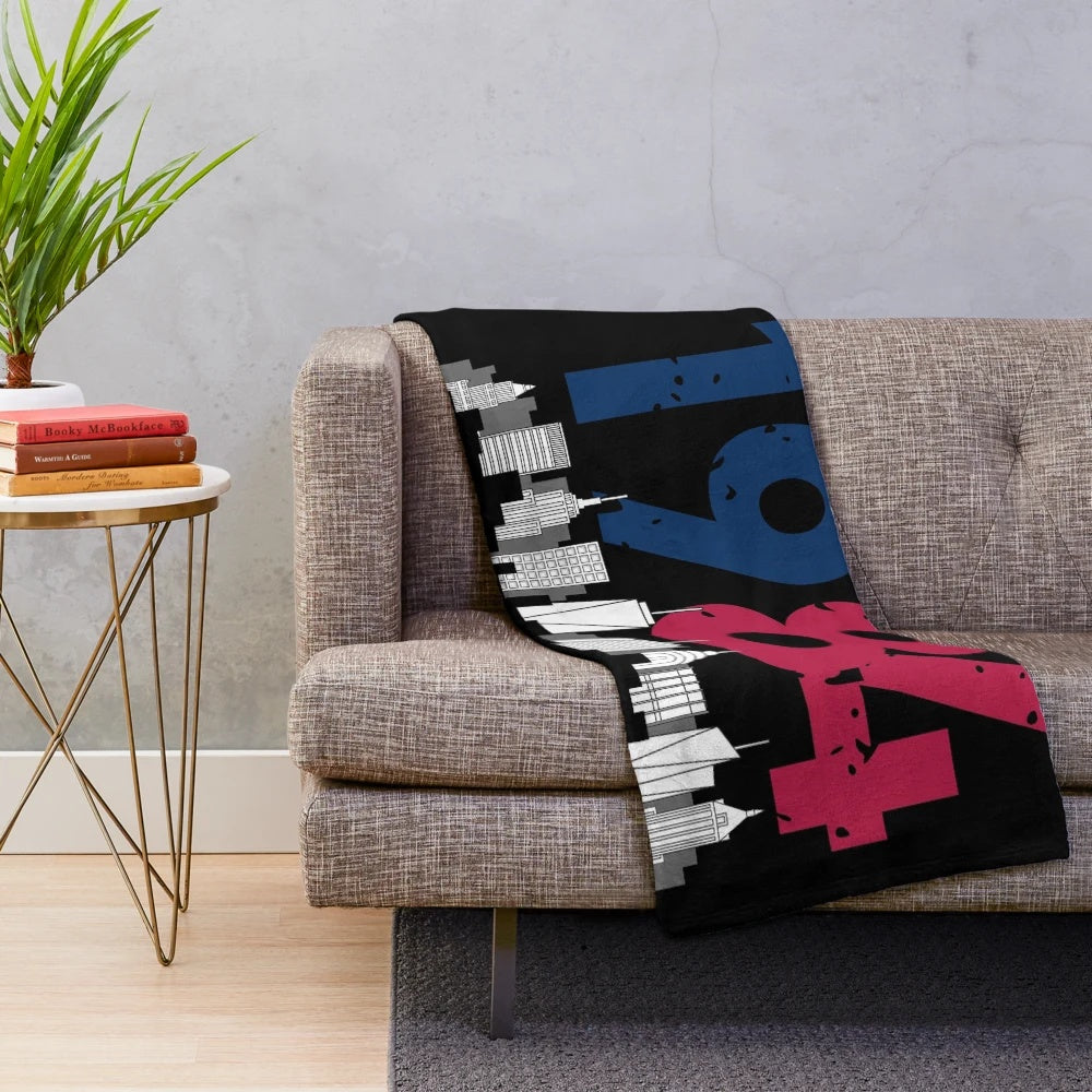 Retro NYC-inspired plush blanket with 80s style pattern
