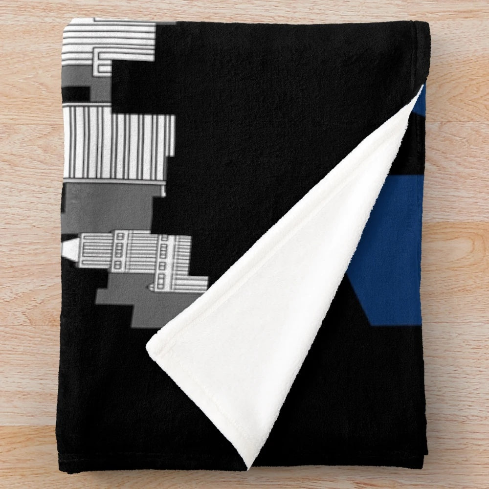 Retro NYC-inspired plush blanket with 80s style pattern