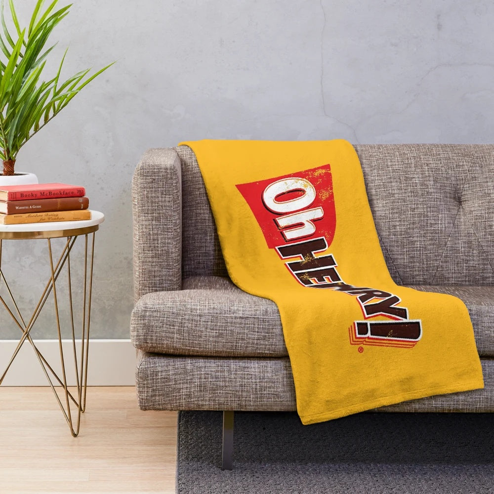 Plush blanket with vintage Oh Henry candy bar design