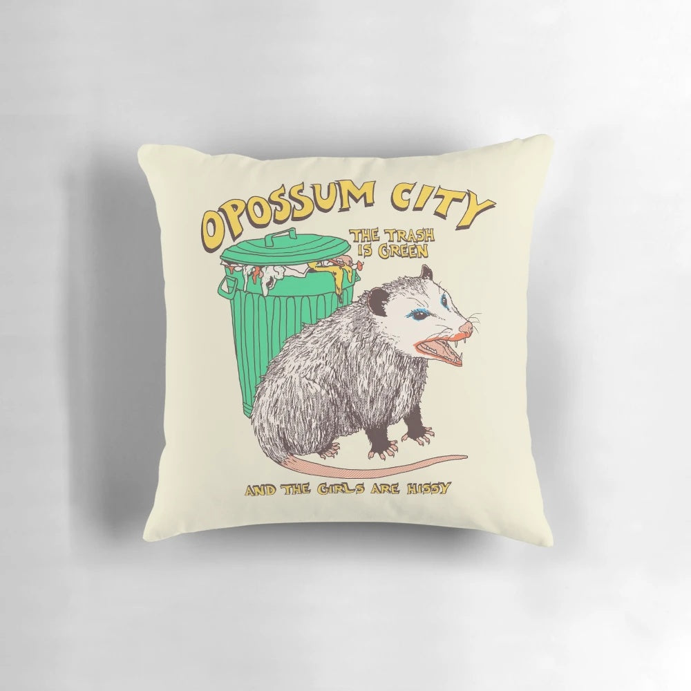 Vibrant opossum/possum graphic on a soft, plush pillow with a retro, vintage aesthetic.