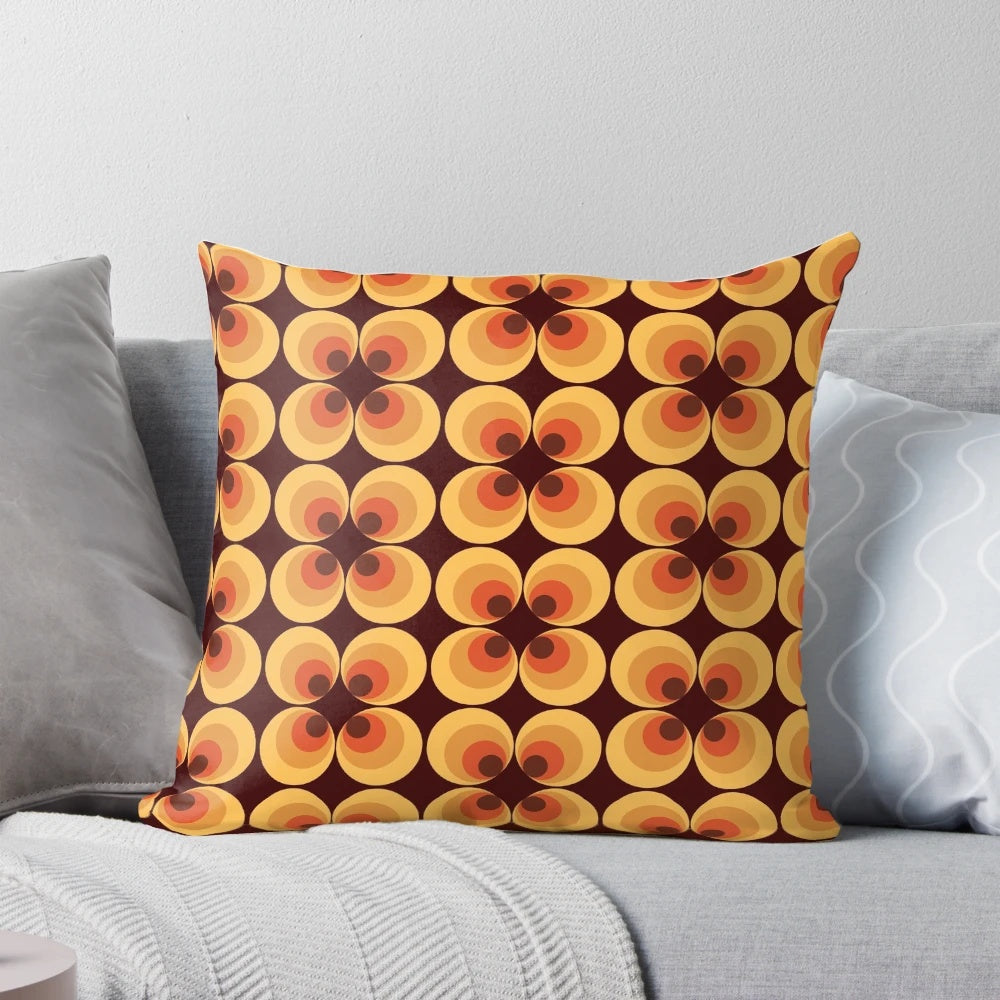 Retro orange 70s inspired pillow with a fun, vintage circle pattern