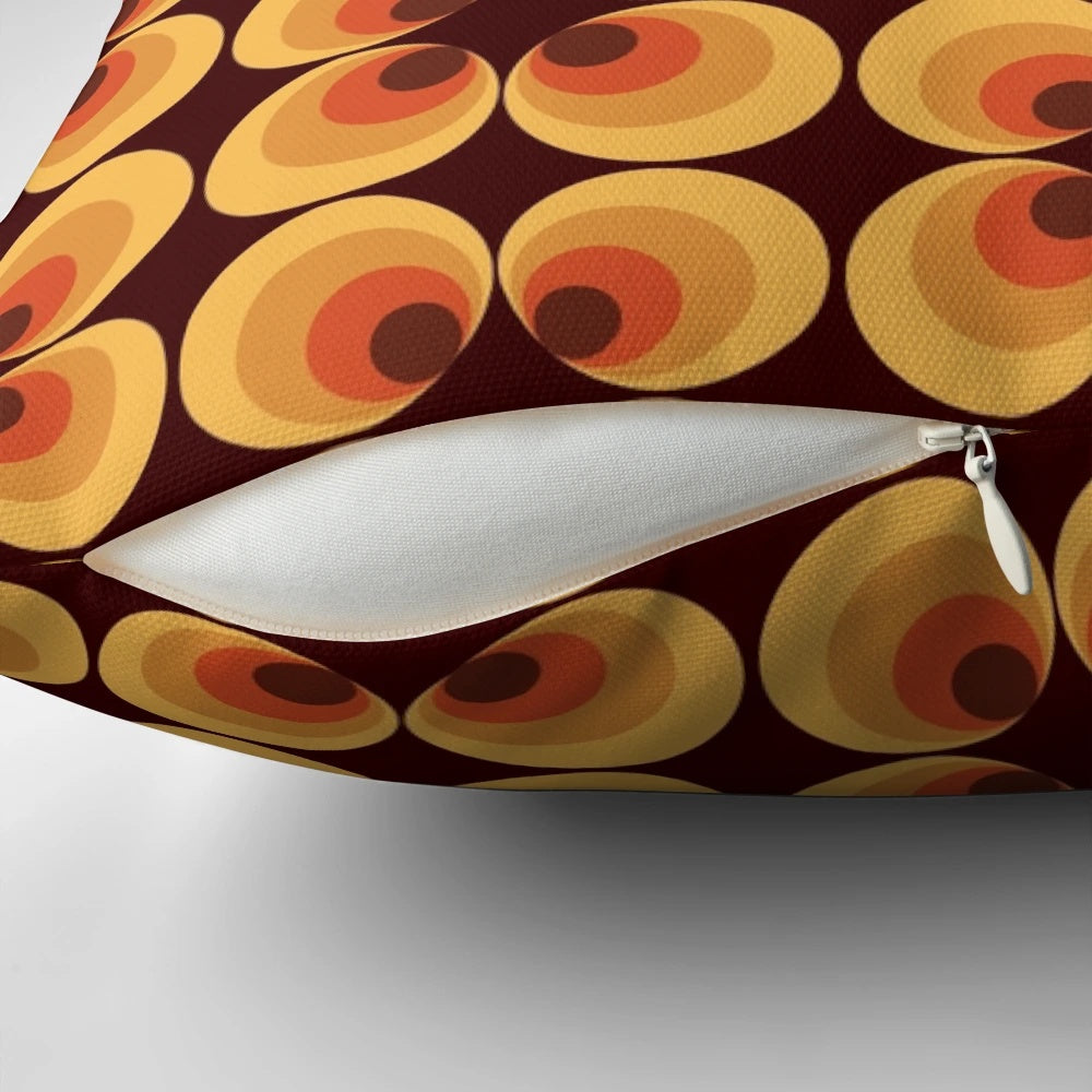 Retro orange 70s inspired pillow with a fun, vintage circle pattern