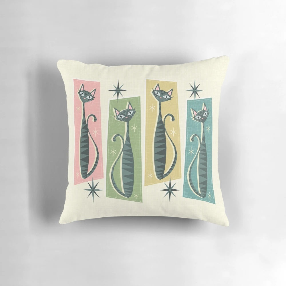 Colorful patchwork tabby cat throw pillow with retro atomic starburst design