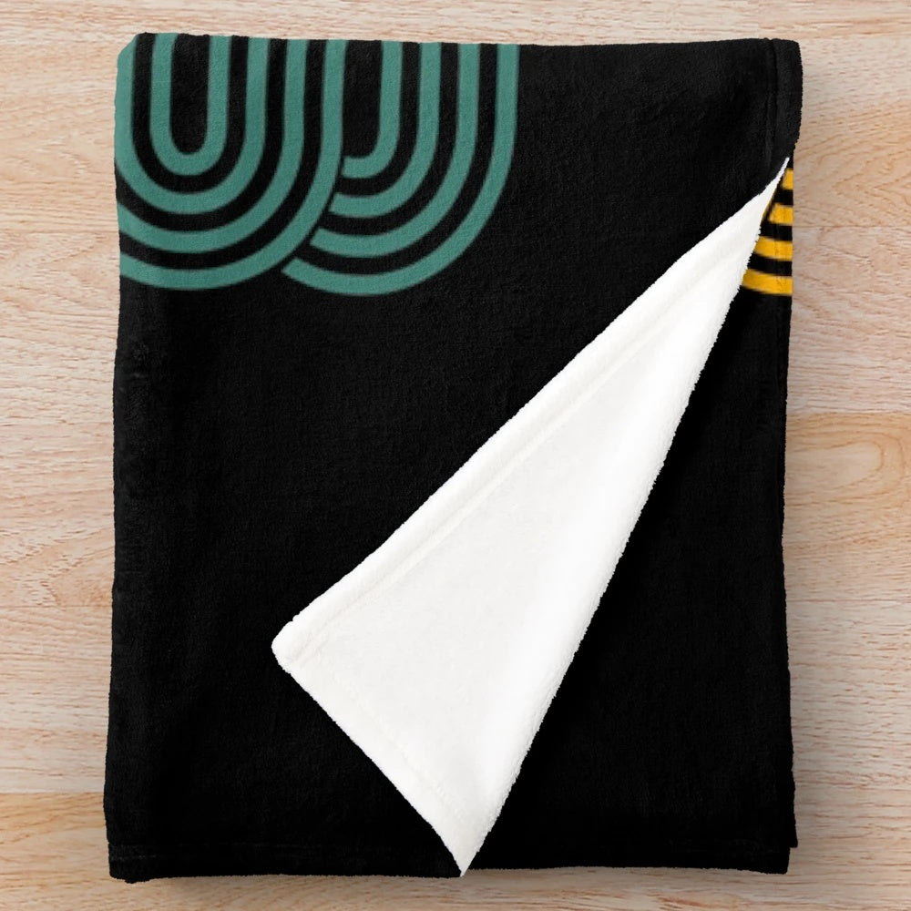 Retro plush blanket with 80s inspired design