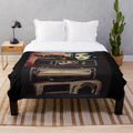 Retro plush blanket featuring classic cinema motifs