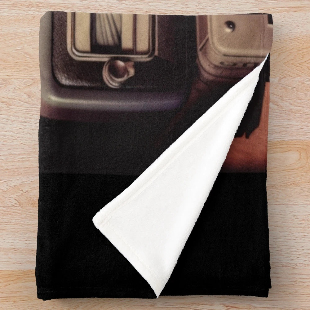 Retro plush blanket featuring classic cinema motifs