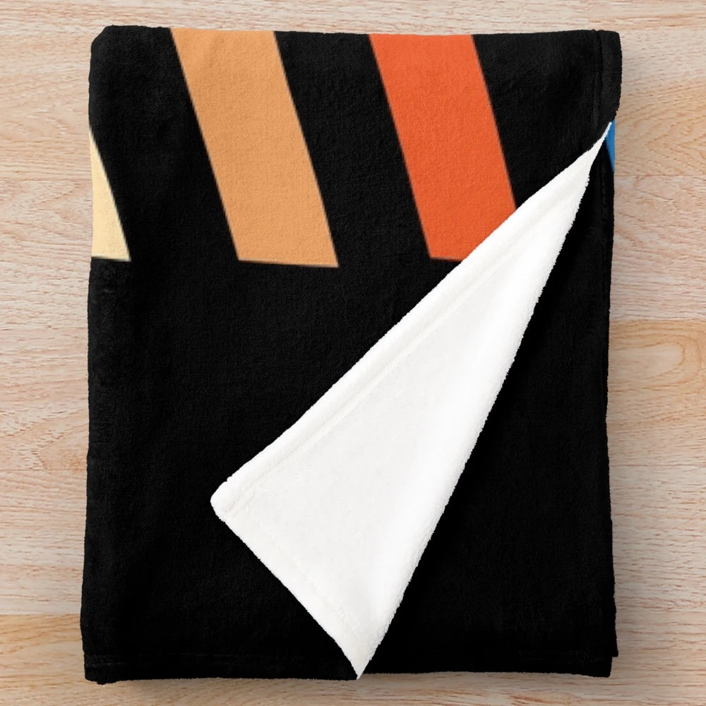 Vintage-style plush blanket featuring a rainbow dice design for RPG and tabletop gaming fans