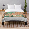 Vintage-style plush blanket featuring the cityscape from Alfred Hitchcock's classic film Rear Window