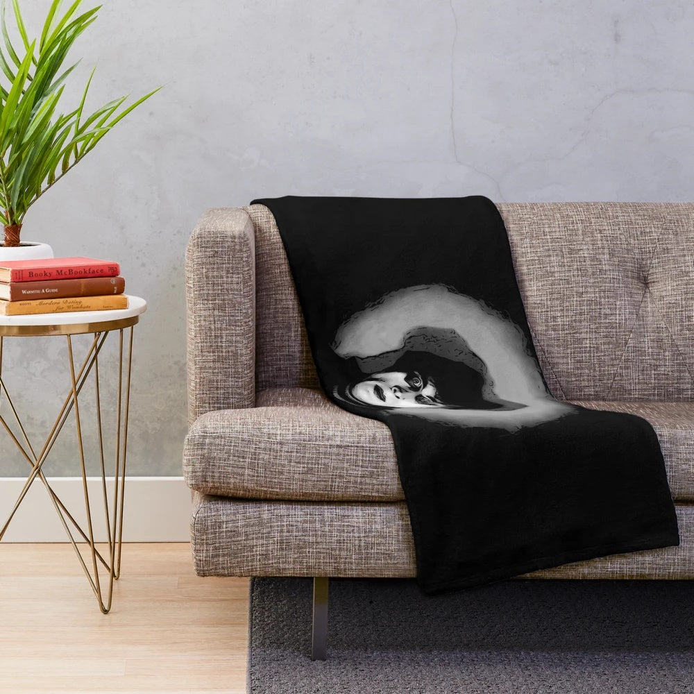 Vintage-style plush blanket featuring a painting of a classic horror movie monster