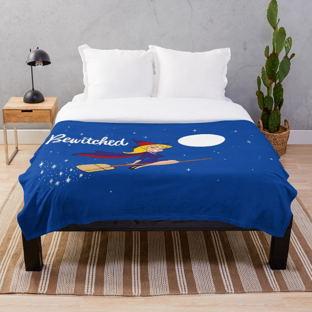 Retro plush blanket featuring characters and imagery from the 1960s TV show 'Bewitched