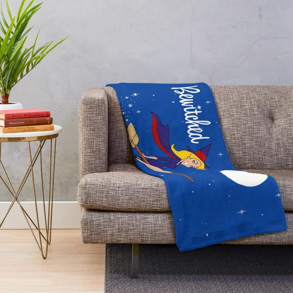 Retro plush blanket featuring characters and imagery from the 1960s TV show 'Bewitched