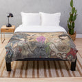 Cozy plush blanket featuring the iconic characters and imagery from the classic 80s fantasy film 'The Dark Crystal
