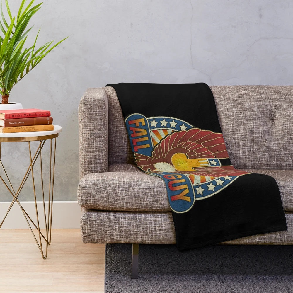 Vintage plush blanket featuring retro stuntman imagery