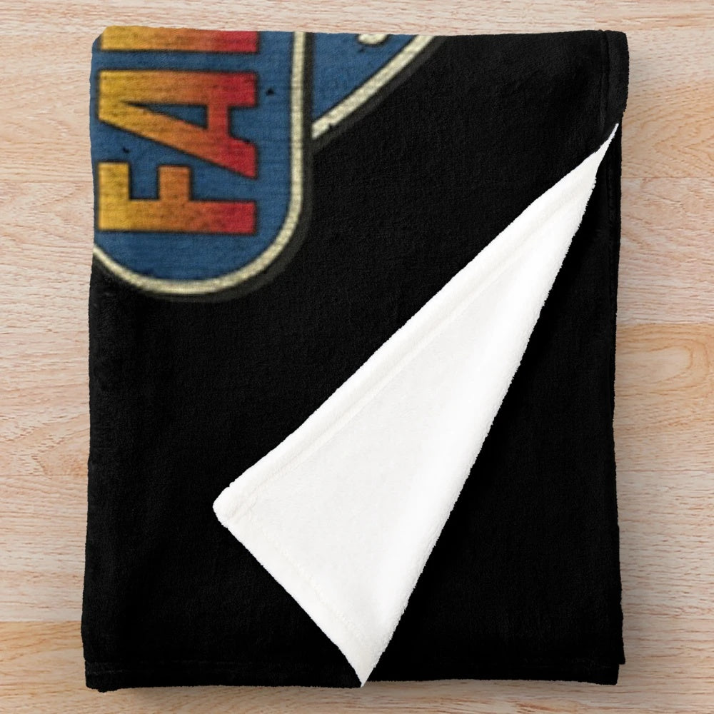 Vintage plush blanket featuring retro stuntman imagery