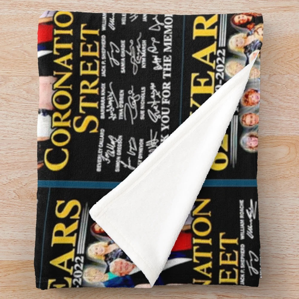 Coronation Street inspired plush blanket with retro pop art design
