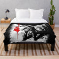 Plush blanket featuring imagery and references to the cult classic horror film The Thing