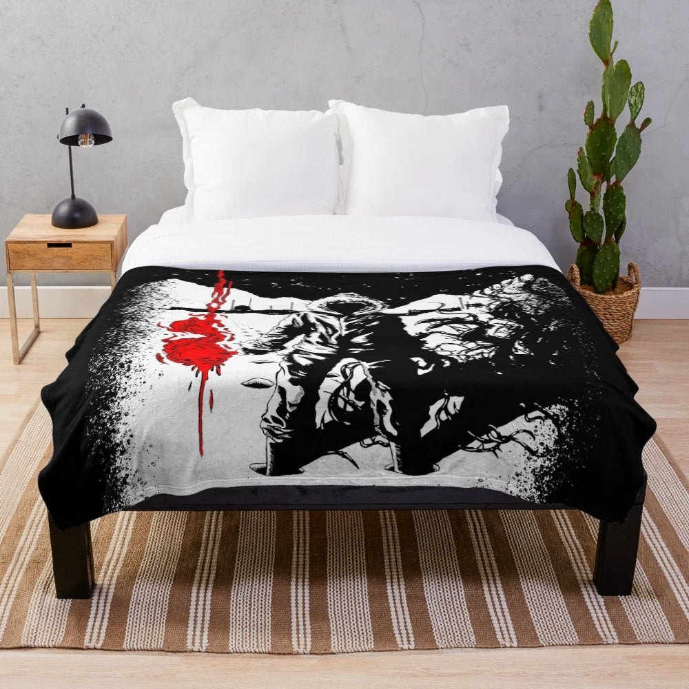 Plush blanket featuring imagery and references to the cult classic horror film The Thing