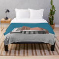 Retro plush blanket featuring vintage illustration of the ODEON Cinema in Newport, Wales