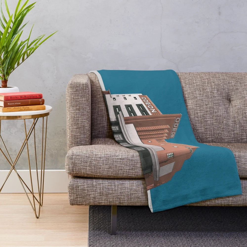 Retro plush blanket featuring vintage illustration of the ODEON Cinema in Newport, Wales
