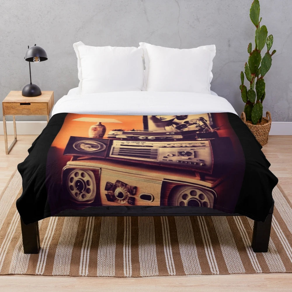 Retro-style plush blanket featuring classic movie motifs