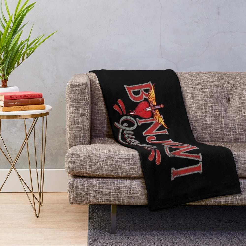 Vintage-inspired plush blanket with Bon Jovi logo and band name