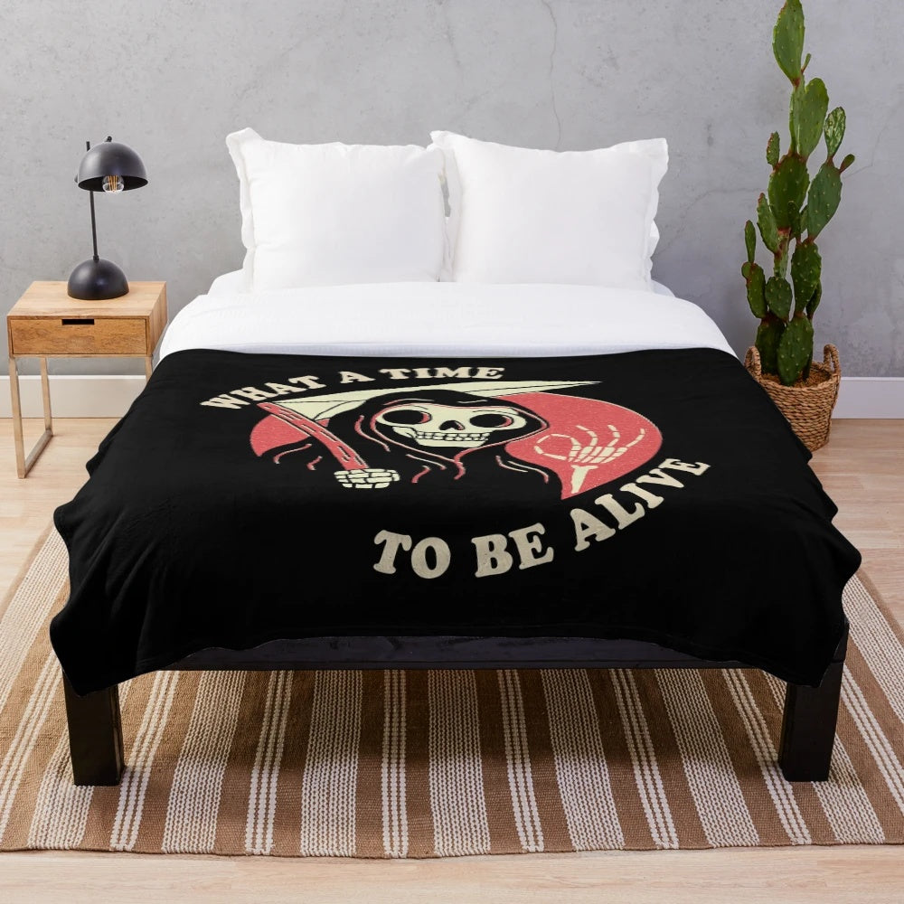 Retro plush blanket with grim reaper and "What A Time To Be Alive" design