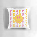 Vibrant yellow and pink preppy smiley face pillow with wavy retro text