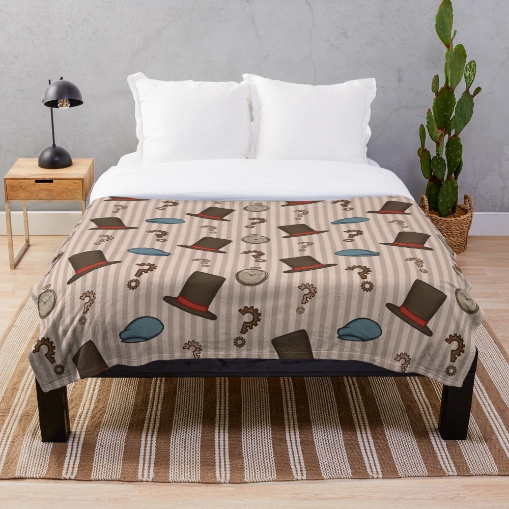 Professor Layton inspired plush blanket with a repeated pattern design in brown and cream