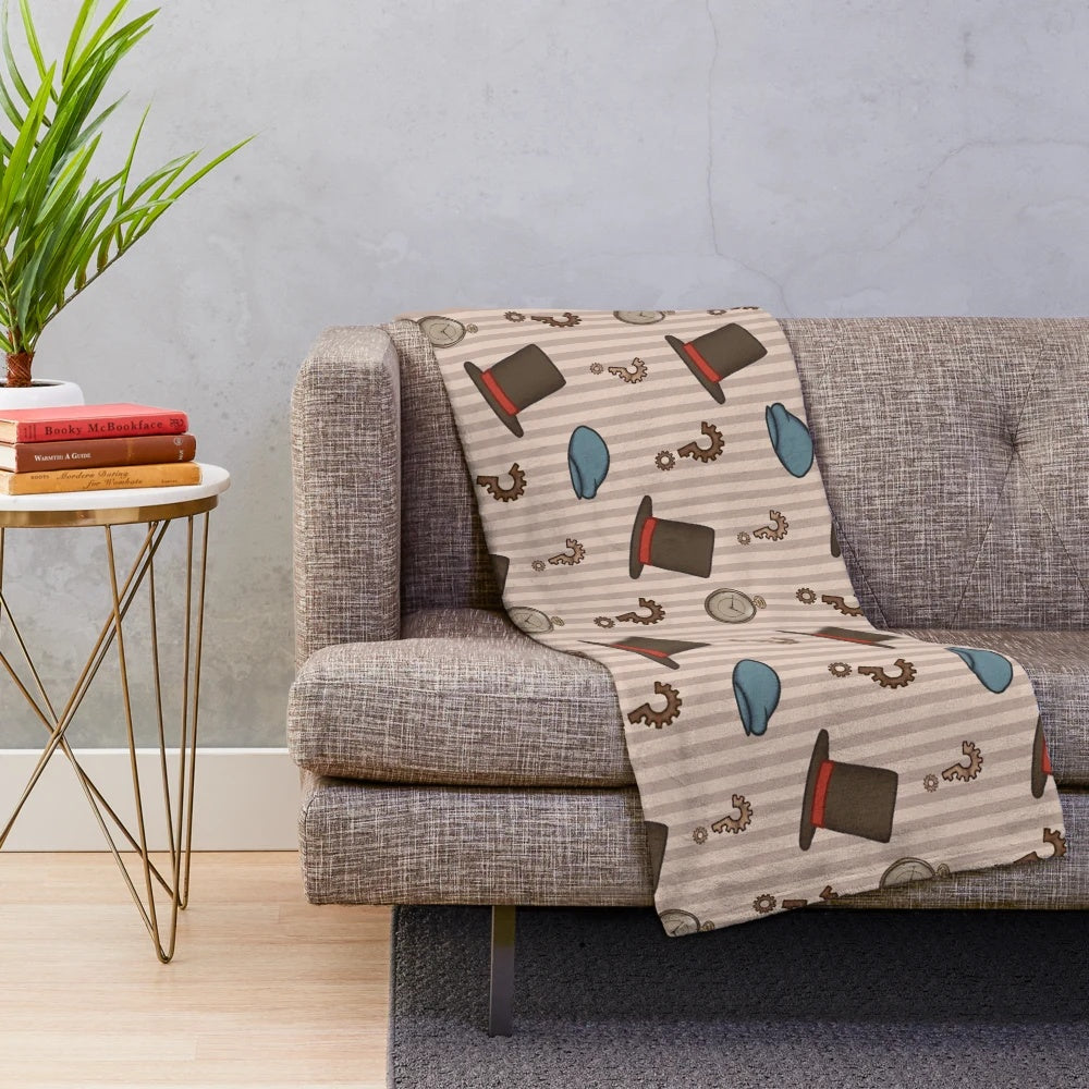 Professor Layton inspired plush blanket with a repeated pattern design in brown and cream