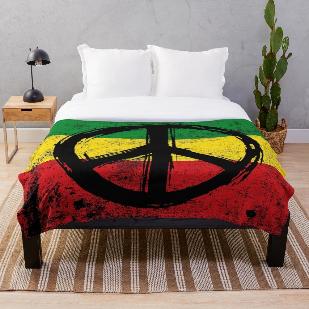 Plush vintage-style blanket featuring a rasta flag design with a peace symbol