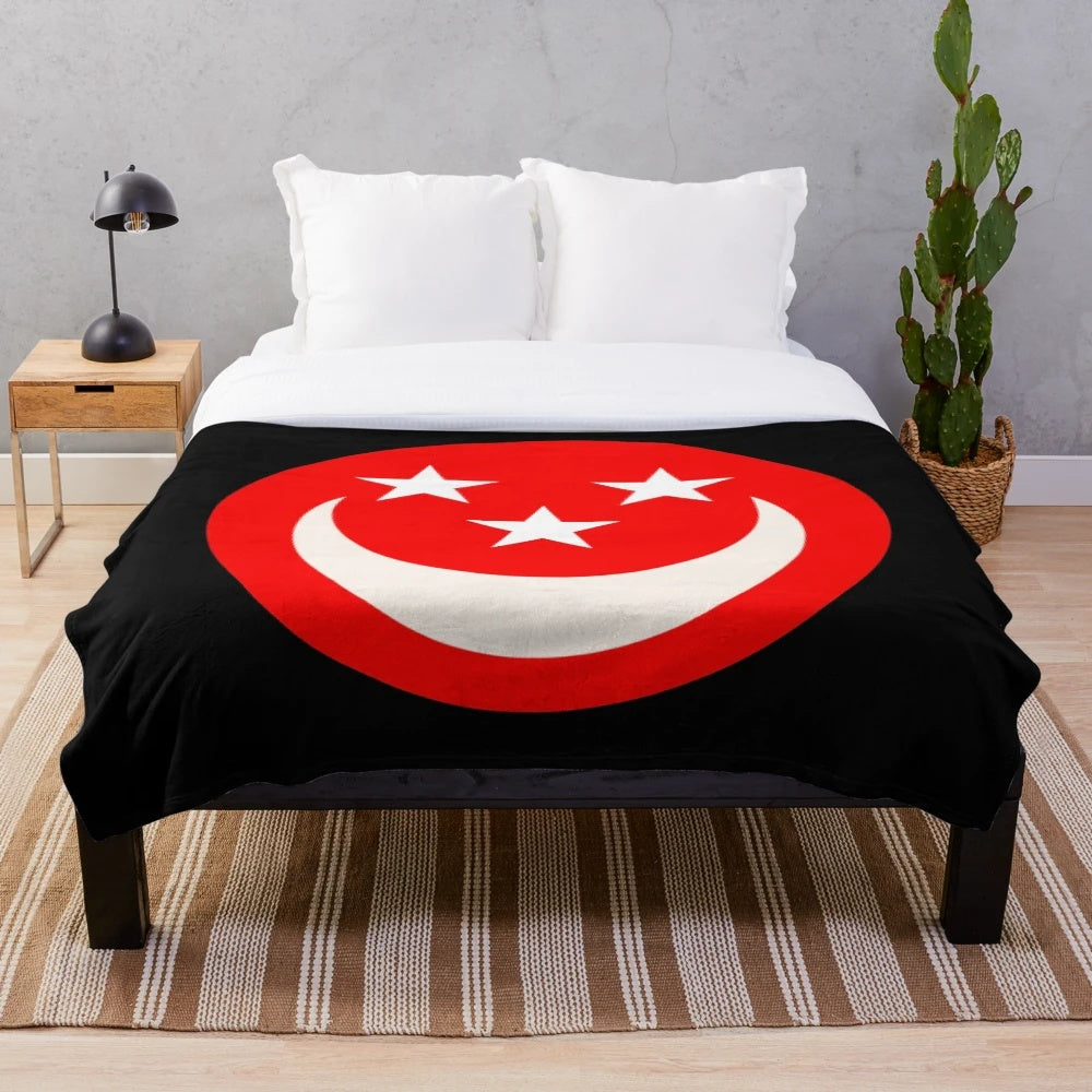 Cozy red plush blanket with smiley face design