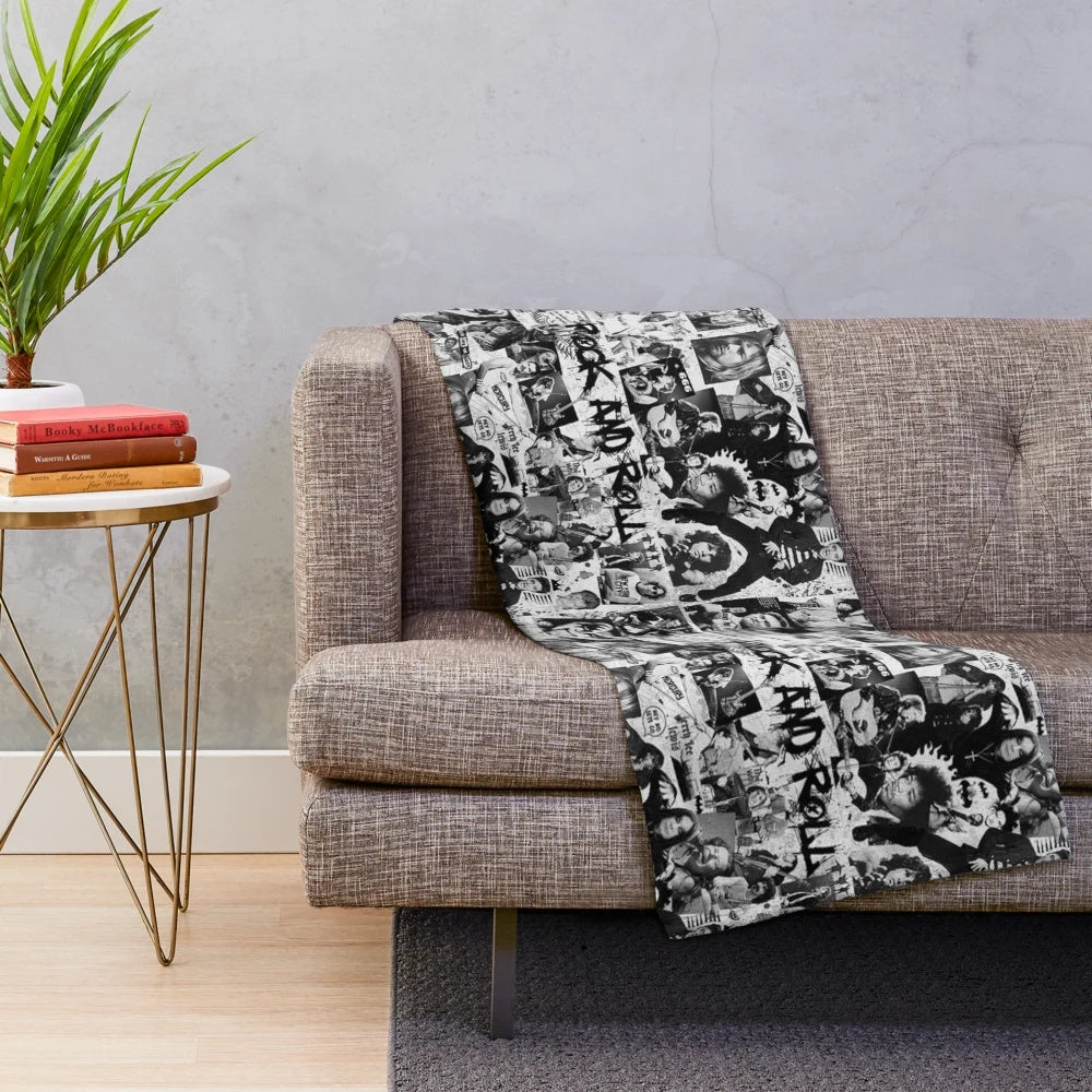 Retro rock and roll plush blanket featuring a collage of iconic music artists and symbols
