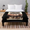 Retro rock band plush blanket featuring classic rock music imagery