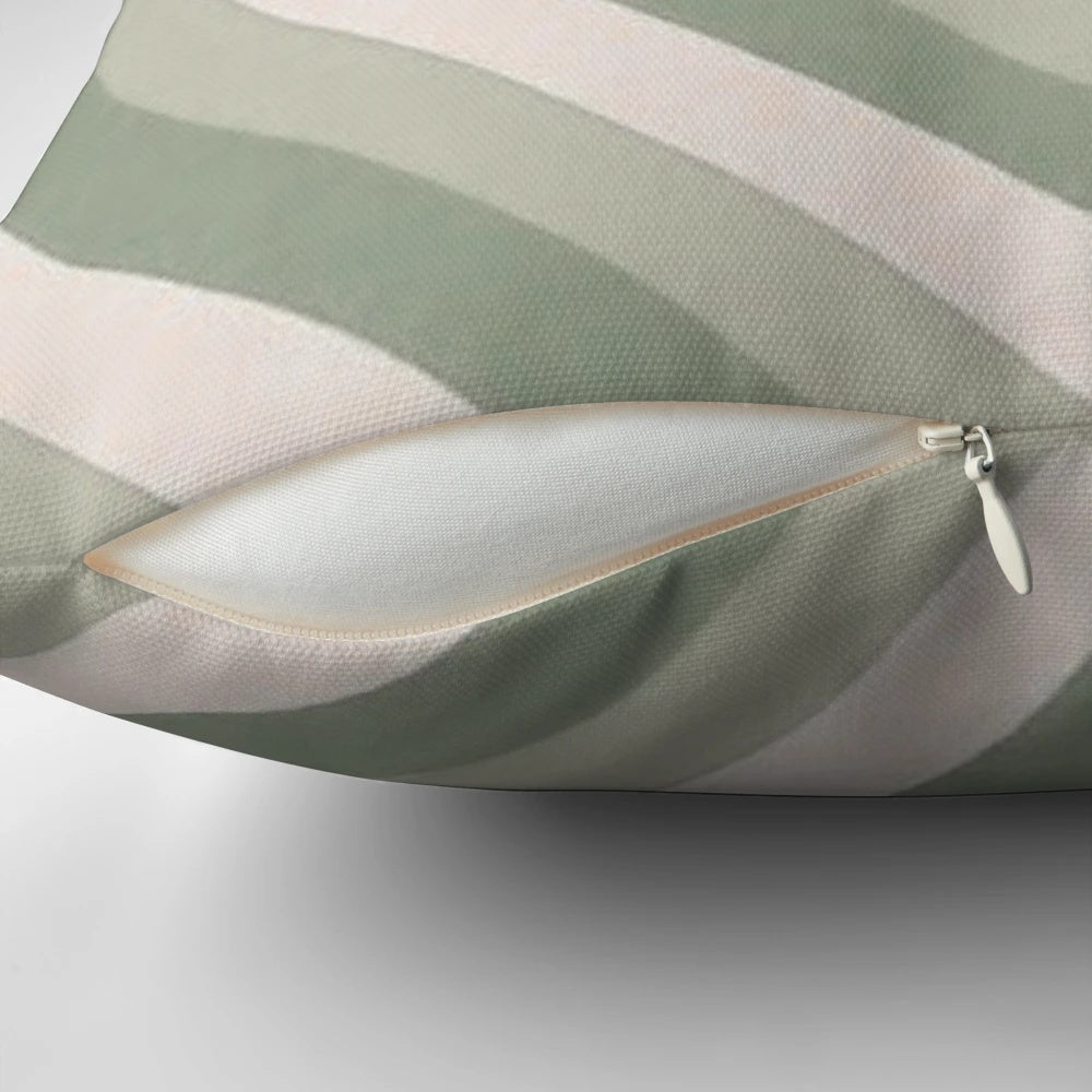 Sage green heart-shaped pillow with a vintage, aesthetic design