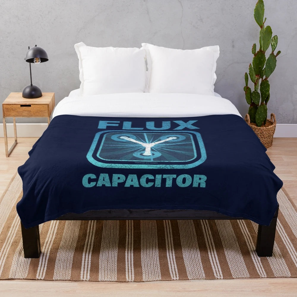 Retro sci-fi inspired plush blanket featuring the iconic flux capacitor design from the Back to the Future movie