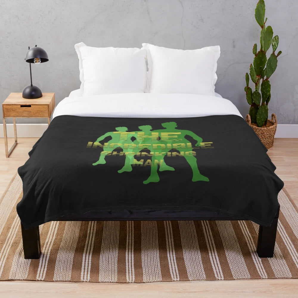 Retro sci-fi plush blanket featuring "The Incredible Shrinking Man
