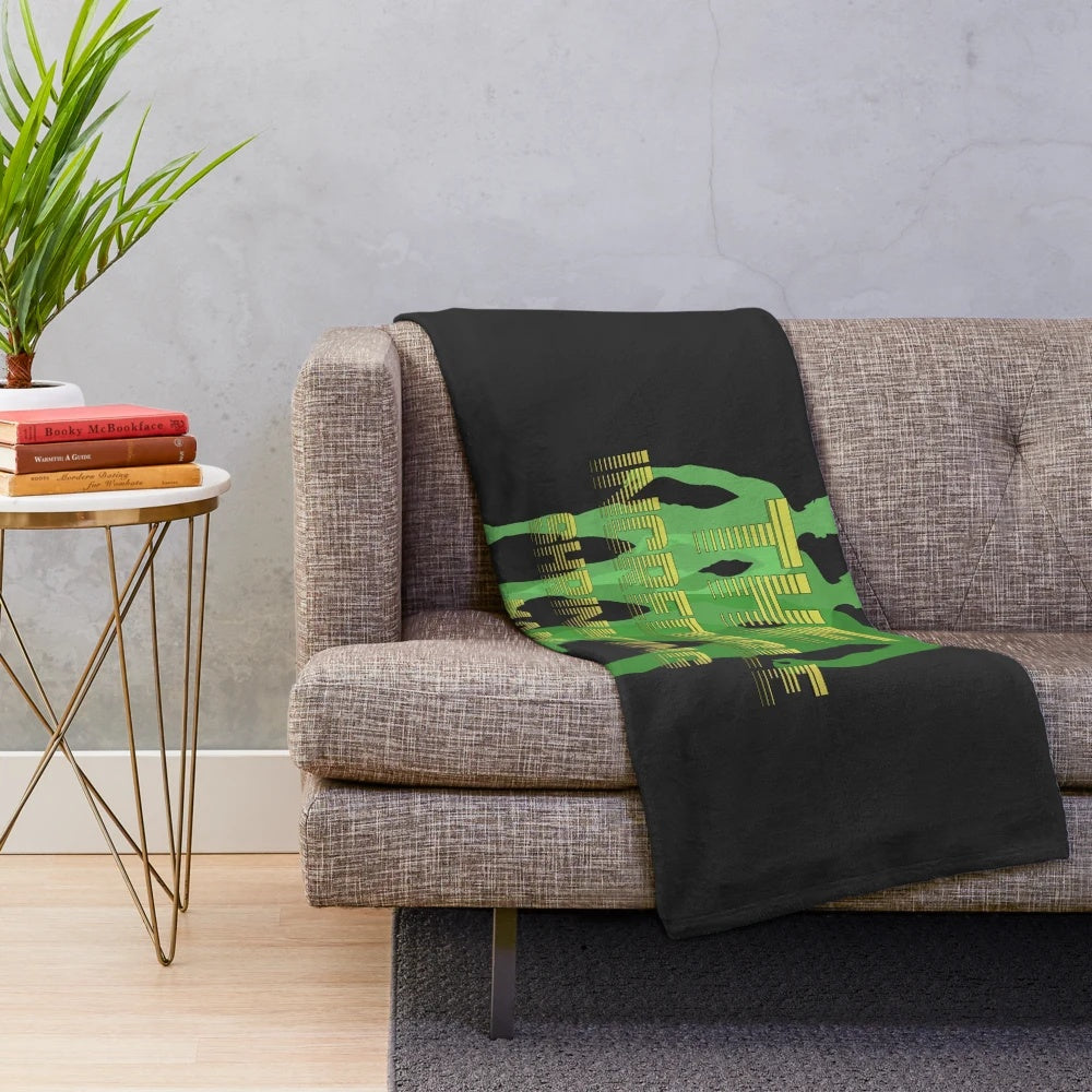 Retro sci-fi plush blanket featuring "The Incredible Shrinking Man